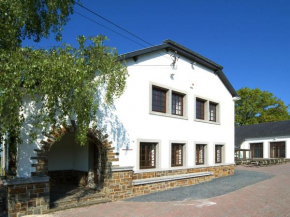 The architecture of a re examined school Gouvy